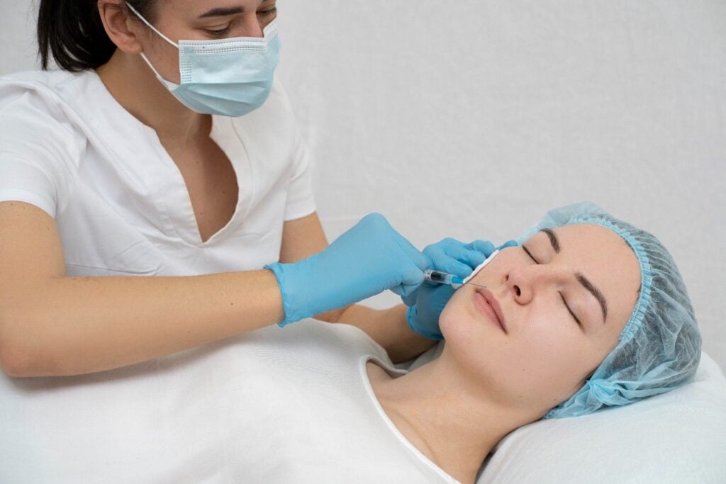 women takes Dermal Fillers treatment