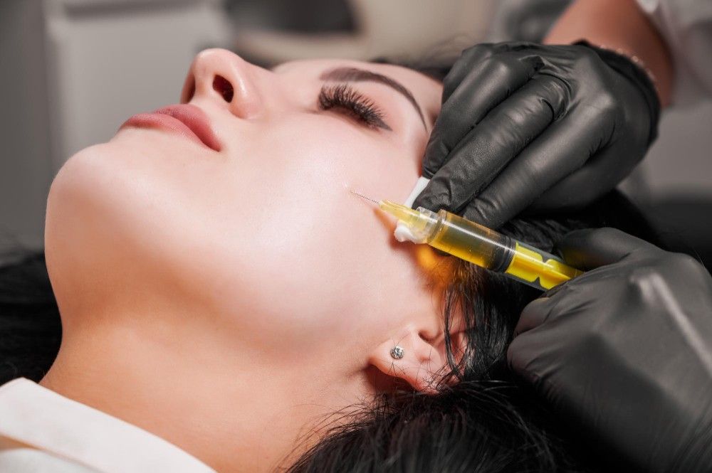 woman takes prp treatment